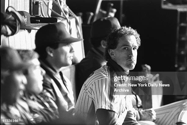 New York Mets' catcher Gary Carter sits dejected in dugout. Boston Red Sox defeated Mets, 9-3, in Game Two of the 1986 World Series at Shea Stadium.