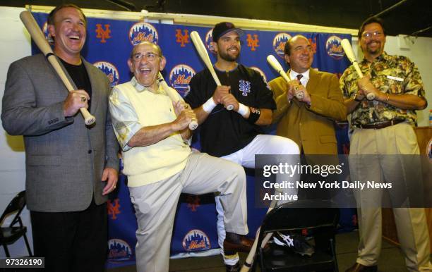 New York Mets' catcher Mike Piazza is flanked by Hall of Fame catchers Gary Carter, Yogi Berra, Johnny Bench and Carlton Fisk during a pregame...