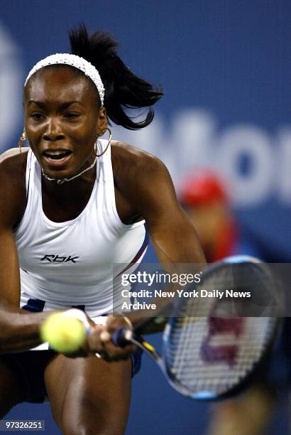 Venus Willians keeps her eye on the ball before swatting a return to Serena Williams in the Women's Final of the U.S. Open at Flushing Meadows-Corona...