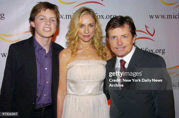 Michael J. Fox is joined by his wife, Tracy Pollan, and son Sam for "A Funny Thing Happened on the Way to Cure Parkinson's..." at the...