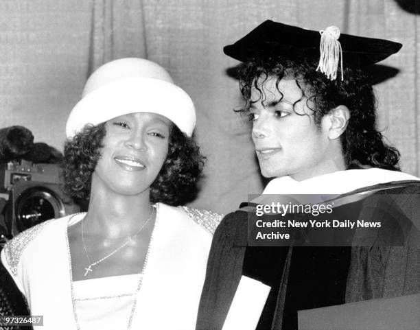 Michael Jackson and Whitney Houston at UNCF dinner at Sheraton Center. Michael received honorary doctor of humanities degree from Fisk University,