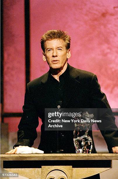 Designer Calvin Klein accepts his award at GQ Men of the Year award ceremony at the Beacon Theater.