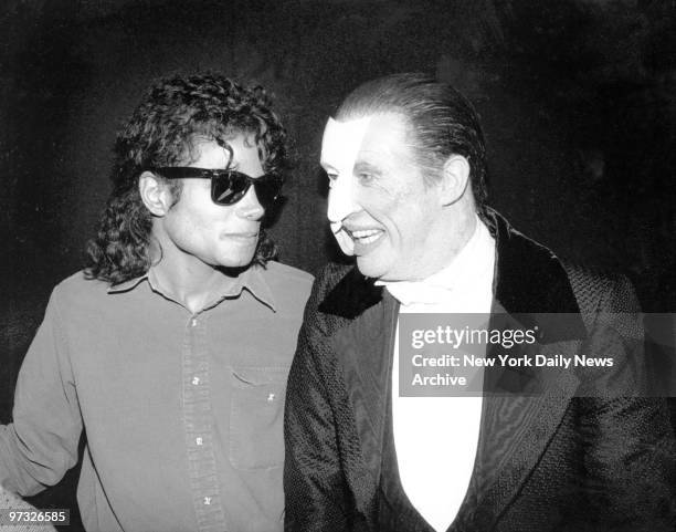 Michael Jackson greets Michael Crawford backstage at the Majestic Theater after seeing the Broadway hit "The Phantom of the Opera.,