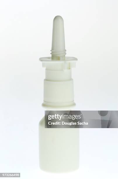 nasal spray bottle on a white background - nasal-cavity stock pictures, royalty-free photos & images