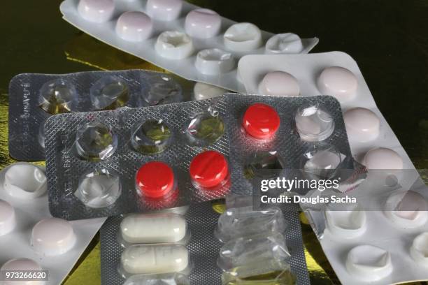 assortment of medication in blister packs - blister fotografías e imágenes de stock