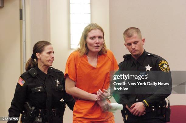 Nicole Pearce is arraigned at Atlantic County Superior Court in Mays Landing, N.J. The heroin addict from Southern California was accused today in...