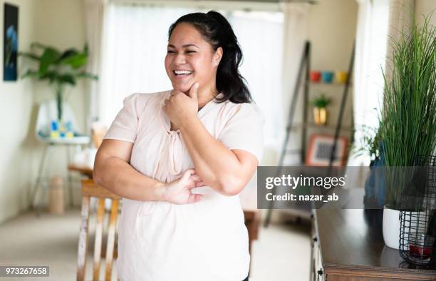 playful expression of maori woman. - maori stock pictures, royalty-free photos & images