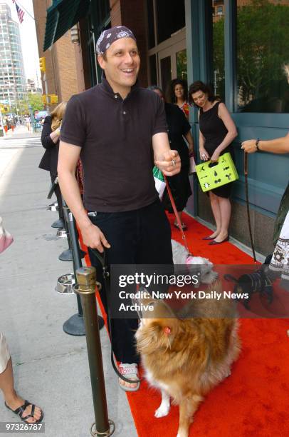 Designer Isaac Mizrahi and his dog, Harry, attend a fourth birthday party for Romeo, author Kim Hastreiter's white Dandie Dinmont terrier, at Trinity...