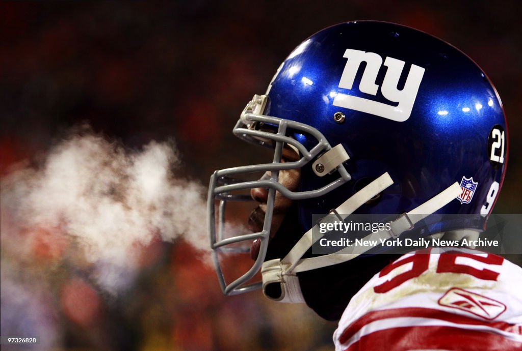 Michael Strahan during Sunday's playoff game between the New