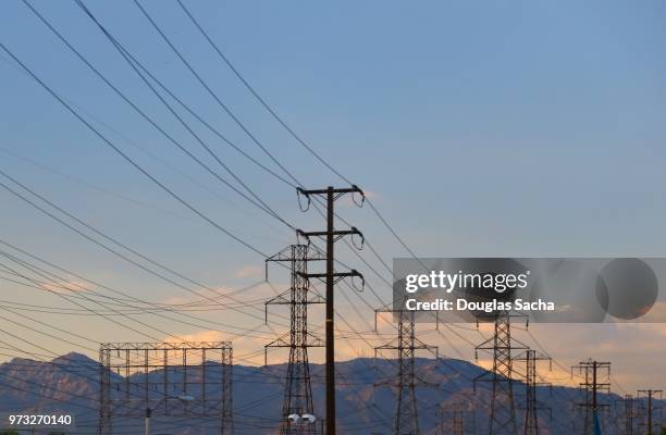 electric power station against sky - high voltage transformer stock pictures, royalty-free photos & images
