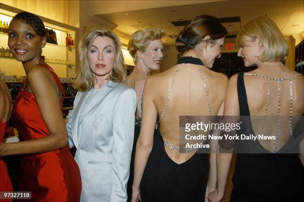 Designer Lane Davis joins her models at the Crestanello Gran Caffe Italiano on Fifth Ave., where she presented her Fashion Week offerings.
