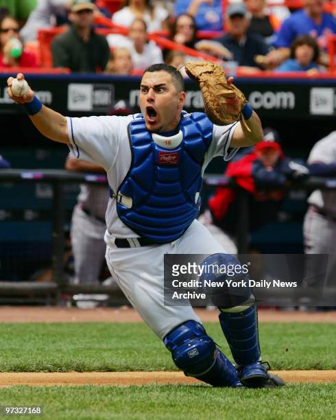 New York Mets' catcher Paul Lo Duca is infuriated after Atlanta Braves' Brian McCann is called safe at home in the second inning at Shea Stadium. Lo...