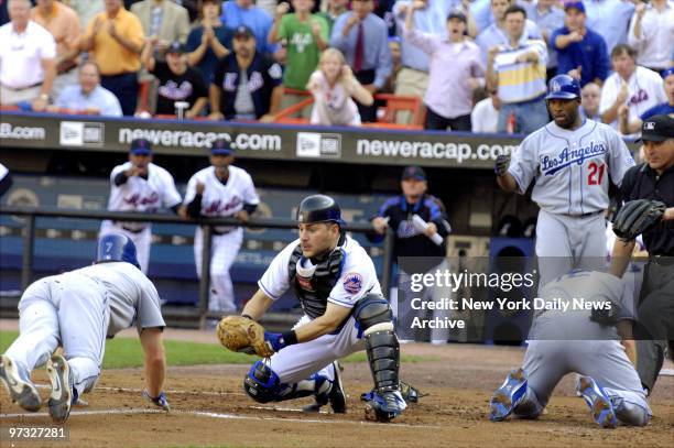 New York Mets' catcher Paul Lo Duca waits to tag Los Angeles Dodgers' J.D. Drew at home plate after tagging Jeff Kent in an unusual double play in...