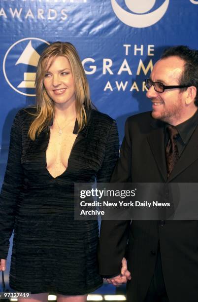 Diana Krall and Elvis Costello arrive hand-in-hand at Madison Square Garden for the 45th Annual Grammy Awards.