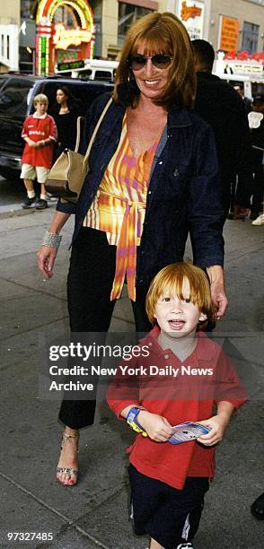 Designer Nicole Miller escorts her son, Palmer to the screening of "Rocky and Bullwinkle" at the AMC Empire 25 Theater in Times Square.