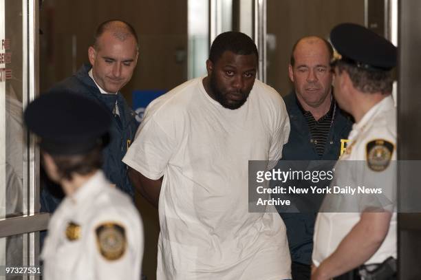Suspect Onta Williams, aka Hamza, is walked out of 27 Federal Plaza after a plot to bomb the Riverdale Jewish Center.