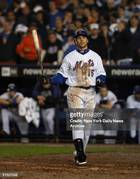 New York Mets' center fielder Carlos Beltran strikes out looking in the ninth to end Game 7 of the National League Championship Series against the...