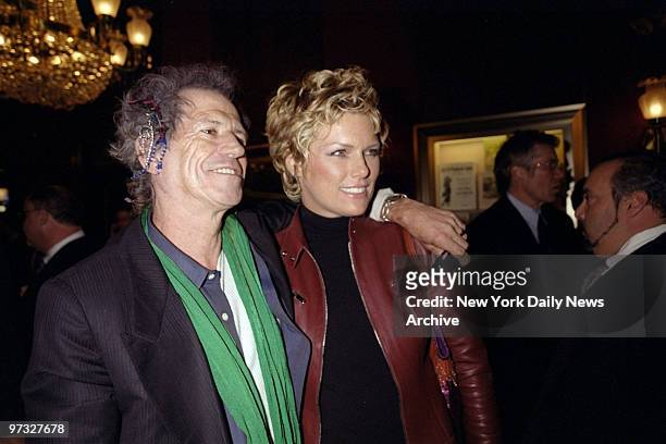 Keith Richards and wife Patti Hanson arrive for the premiere of the movie "Bringing Out the Dead" at the Ziegfeld Theater.