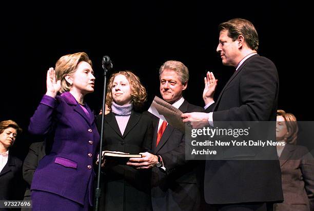 Vice President Al Gore and Hillary Rodham Clinton recreate her swearing-in as New York's junior senator as President Bill Clinton and daughter...