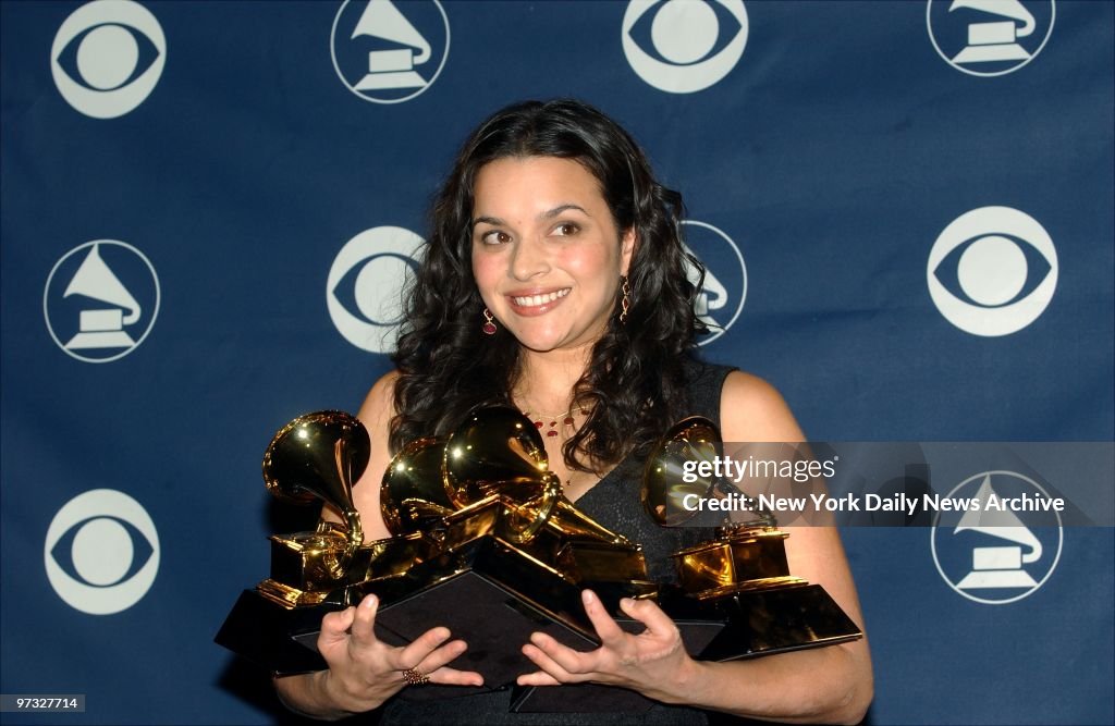 Norah Jones holds her five awards backstage at the 45th annu