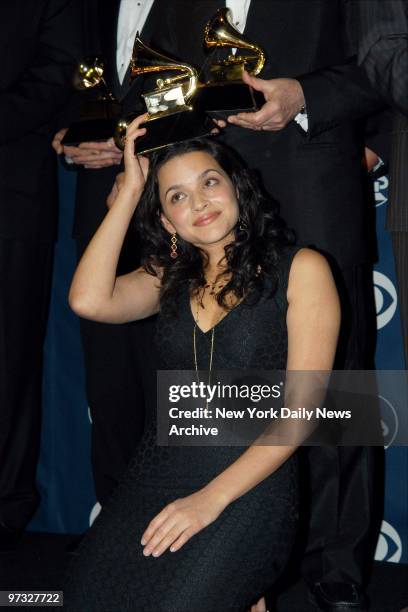 Norah Jones holds one of her five awards backstage at the 45th annual Grammy Awards at Madison Square Garden. Jones took the honors for Record of the...