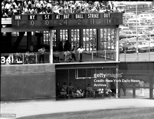 New York Mets' Cleon Jones leaps up against bullpen screen in leftfield in vain attempt to catch ball hit by Willie Mays in first inning. Ball...