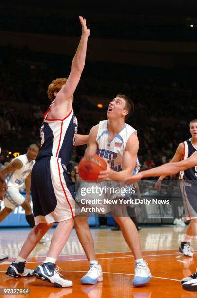 North Carolina Tarheels' Tyler Hansbrough looks to shoot over Gonzaga Bulldogs' David Pendergraft during the National Invitation Tournament Season...