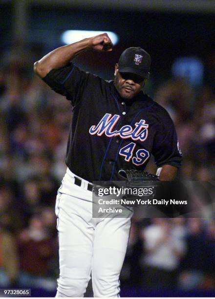 New York Mets' closer Armando Benitez pumps his fist after getting the last out in a game against the Atlanta Braves at Shea Stadium. The Mets...