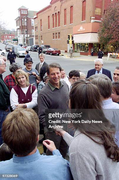 Vice President Al Gore greets people on the way to a campaign stop at a senior citizen center in Fort Madison, Iowa.