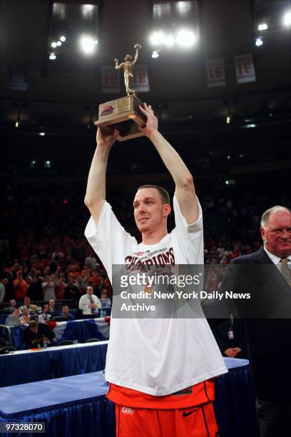 Syracuse Orange guard Gerry McNamara shows off his MVP trophy after the Orange defeated the Pittsburgh Panthers, 65-61, in the Big East Championship...