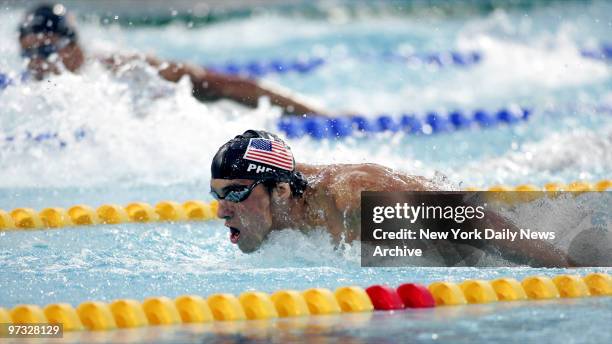 Michael Phelps of the U.S. Swims to a first place finish in the 200-meter butterfly in the Aquatic Center at the 2004 Summer Olympic Games in Athens.