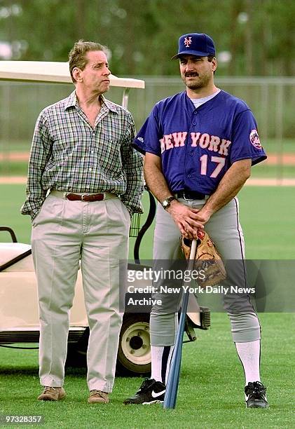 New York Mets' co-owner Fred Wilpon watches spring training practice with Keith Hernandez in Port St. Lucie, Fla. ,