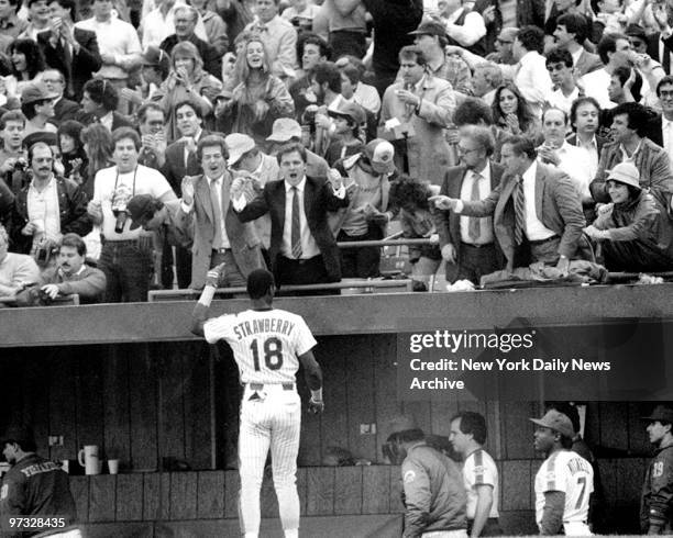 New York Mets Darryl Strawberry being congratulated after homer in 5th inning.