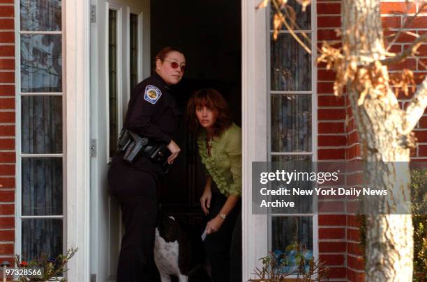 Michaella Oefelein, ex-wife of astronaut William Oefelein, opens the door to her Houston home for a police officer. Lisa Marie Nowak, a 43-year-old...