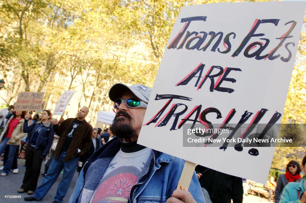 Kenneth Christy joins other protesters at an anti-trans fat