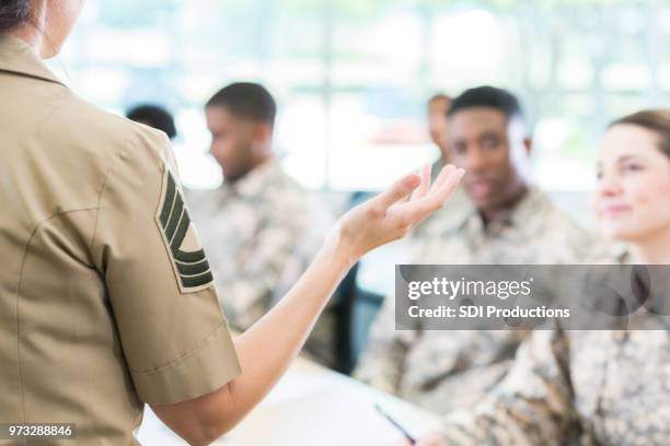 unrecognizable military officer teaches at military academy - military courage stock pictures, royalty-free photos & images