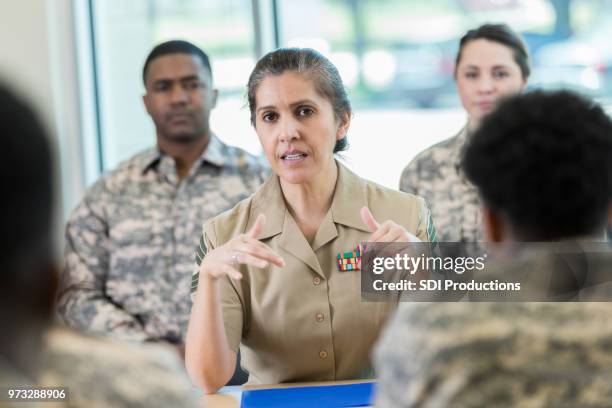 military officer talks with new recruits - military inspection stock pictures, royalty-free photos & images