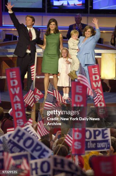 Vice presidential candidate John Edwards is joined by his family, daughters Cate and Emma Claire, son Jack and wife Elizabeth , onstage at Boston's...