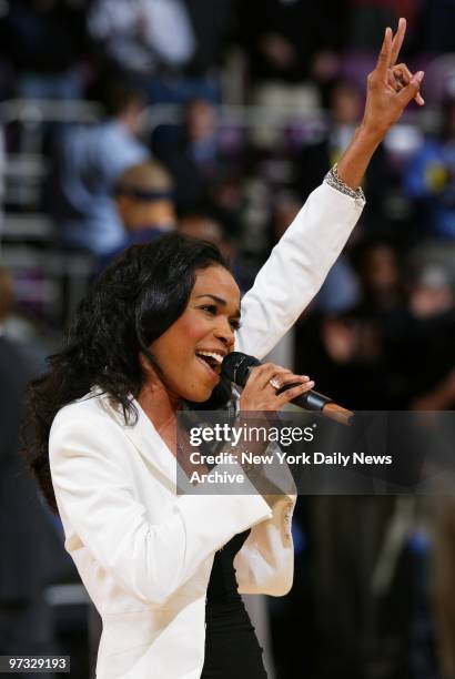 Michelle Williams sings the national anthem at Madison Square Garden during Game 4 of first-round playoffs between the New York Knicks and the New...