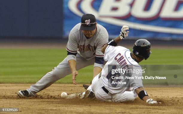 New York Mets' Endy Chavez is safe at second as Washington Nationals' second baseman Jose Vidro bobbles the ball in the fifth inning at Shea Stadium....