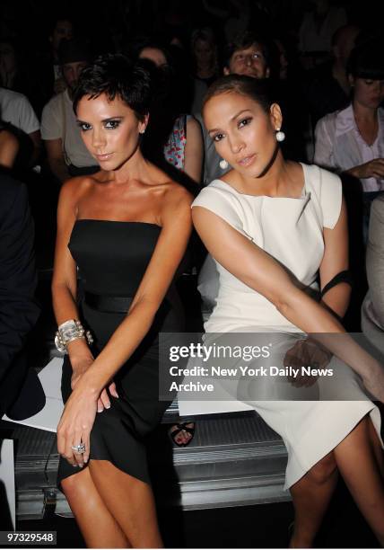 Victoria Beckham and Jennifer Lopez at the Marc Jacobs Fashion Show held at the New York State Armory on Lexington Ave.