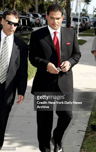 Detroit Tigers' catcher Ivan "Pudge" Rodriguez arrives at St. Jude's Catholic Church to attend the wedding of New York Mets' teammate Mike Piazza and...
