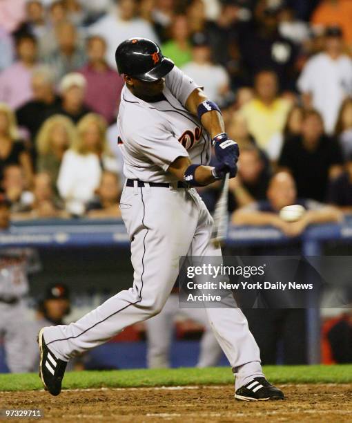 Detroit Tigers' Craig Monroe hits a three-run homer in the ninth inning to defeat the New York Yankees, 5-3, in the second game of a double header at...