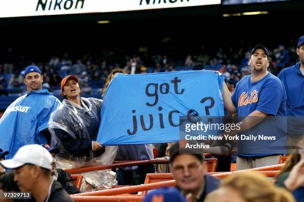 New York Mets' fans heckle San Francisco Giants' Barry Bonds with a sarcastic sign referring to his alleged use of steroids during the first game of...