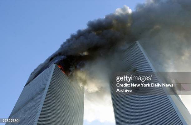 World Trade Center Terrorist Attack-Smoke billows from the twin towers of the World Trade Center - the aftermath of a terrorist attack. A hijacked...
