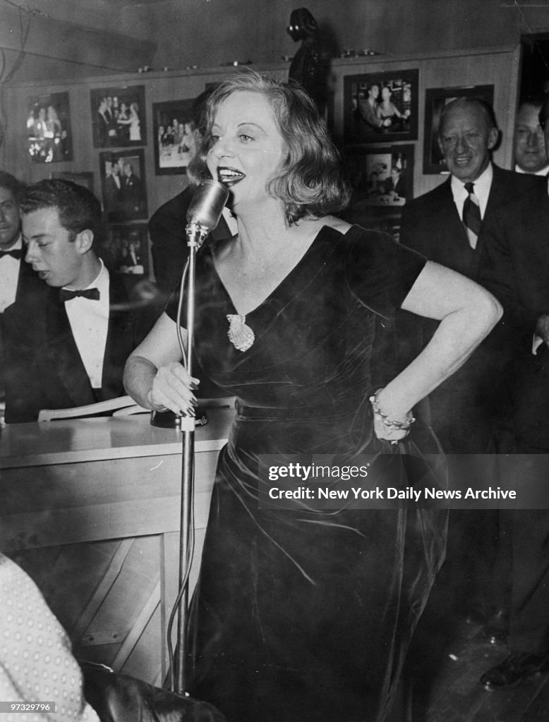 Tallulah Bankhead singing at a party in her honor at Bruno's Pen and ...