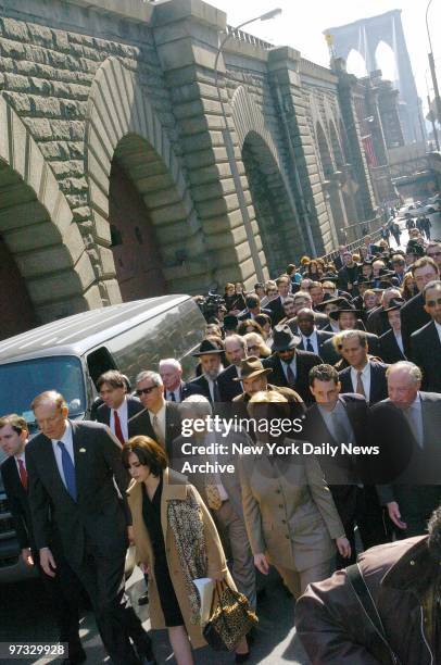 Devorah Halberstam is joined by dignitaries as they walk across the Brooklyn Bridge ramp in memory of her son, Ari. The 16-year-old Orthodox Jewish...