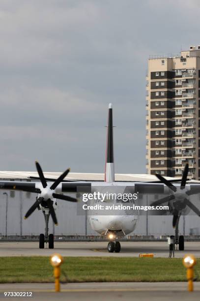 Propellers of CityJet Fokker F-50 taxiing.