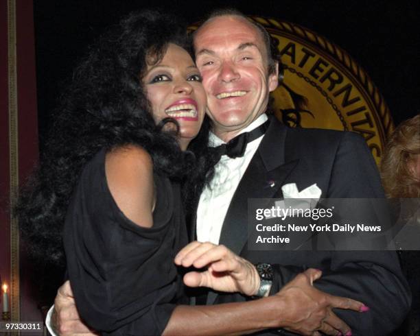 Diana Ross and husband Arne Naess show that they're happy enough to be at the Friars Club tribute to Diana Ross at the Waldorf-Astoria.