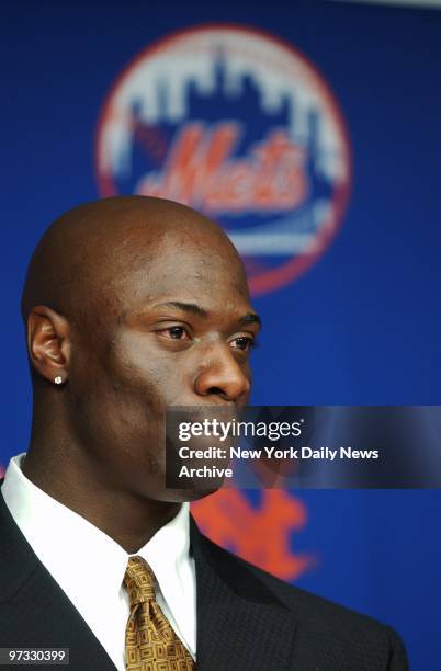 Mike Cameron, the New York Mets' new center fielder, speaks at his introduction to the Big Apple at Shea Stadium.